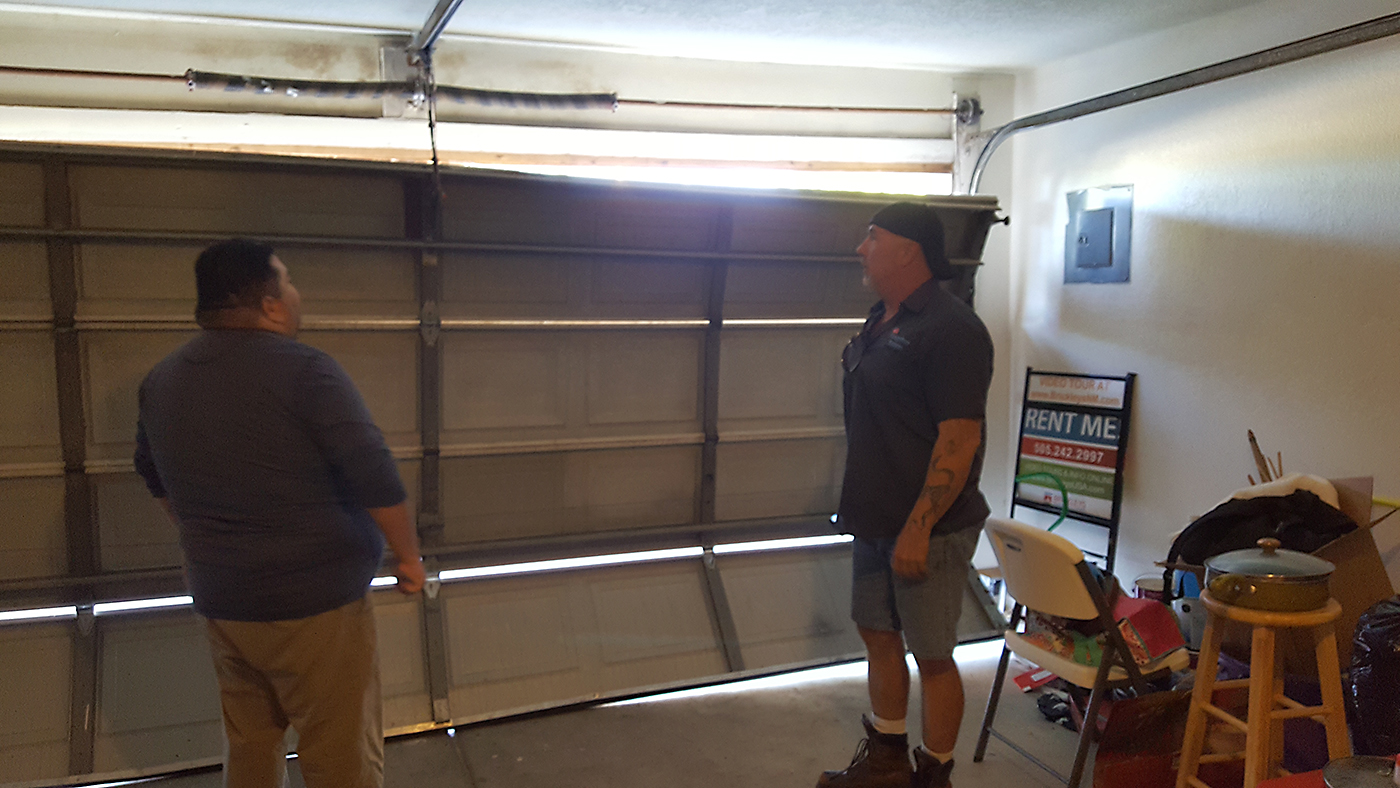 Albuquerque Garage Door Broken Panels Inspection